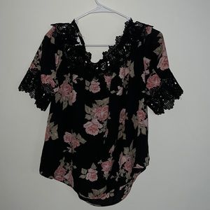 Loose fitting floral top with crochet neck line